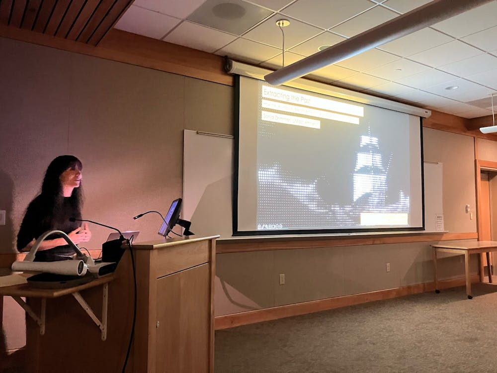 Sonja Drimmer lecturing on AI and its effects on the art industry.