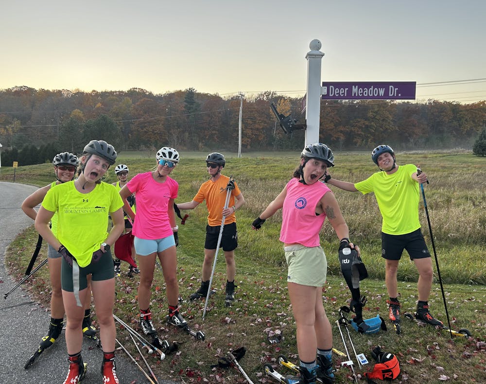 <p>Club Nordic skiers sporting the signature bright colors</p>