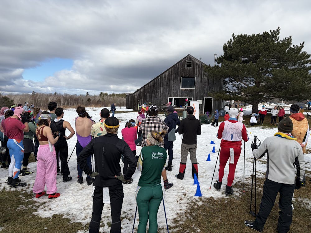Community members participate in Goshen's annual "Pig Race' ski competition.