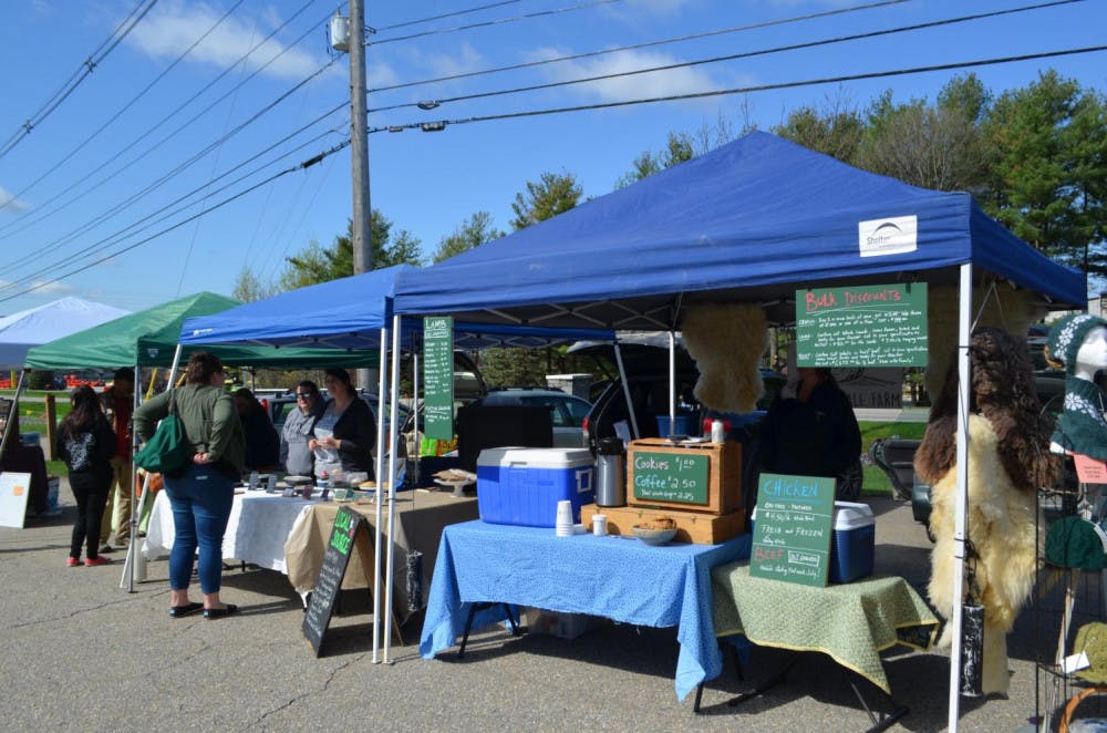 <span class="photocreditinline">Campus File Photo/ Benjy Renton</span><br />The Middlebury Farmers Market on a sunny day last spring.