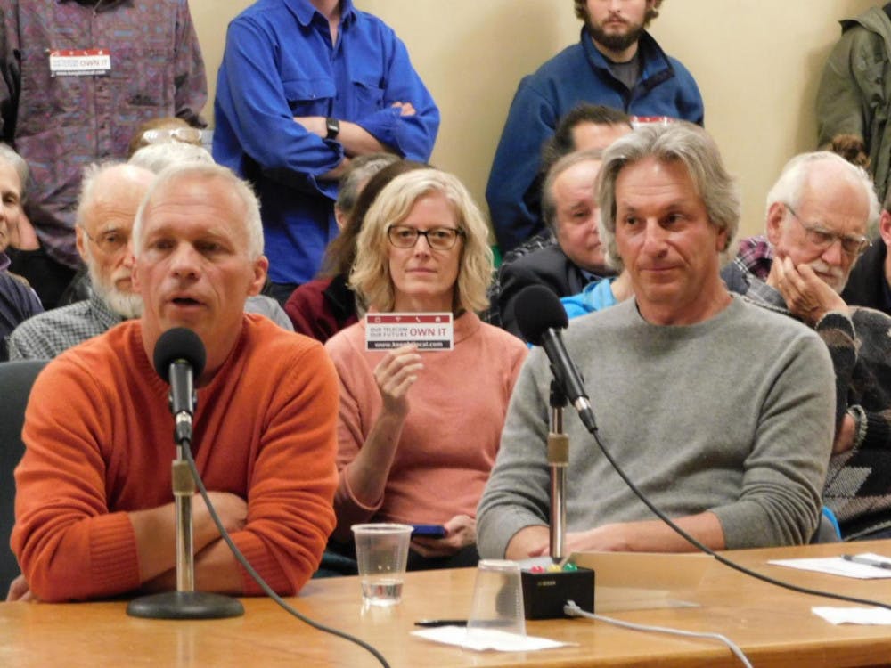 <span class="photocreditinline">Pat Bradley / WAMC</span><br />Alan Matson (left) chair of KBTL Coop, and Eliot Noss (right) CEO of Ting, testify in front of Burlington City Council.
