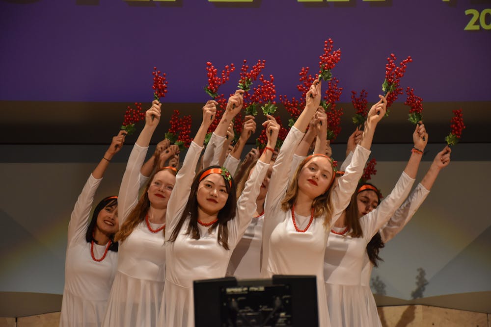 Students perform a dance celebrating Kalyna, a red flower that symbolizes resilience.