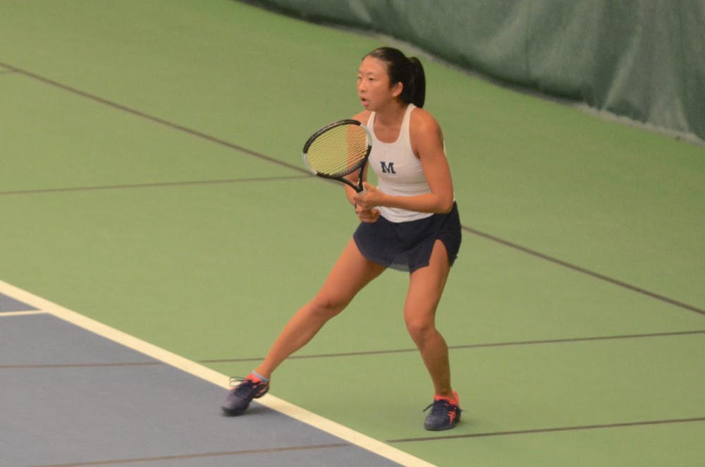 <span class="photocreditinline"><a href="https://middleburycampus.com/39367/uncategorized/benjy-renton/">BENJY RENTON</a></span><br />Emily Bian '21 returns a serve from her opponent at the Middlebury Invitational.