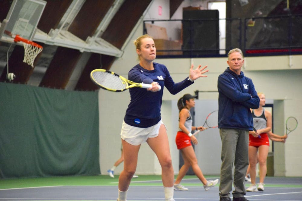 <span class="photocreditinline"><a href="https://middleburycampus.com/39367/uncategorized/benjy-renton/">Benjy Renton</a></span><br />Maddi Stow ’20 rushes to hit the ball during the weekend match against No. 6 Wesleyan.