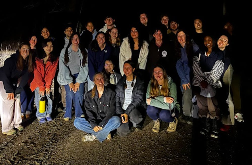 Students gather after participating in EcoRep’s salamander crossing event.