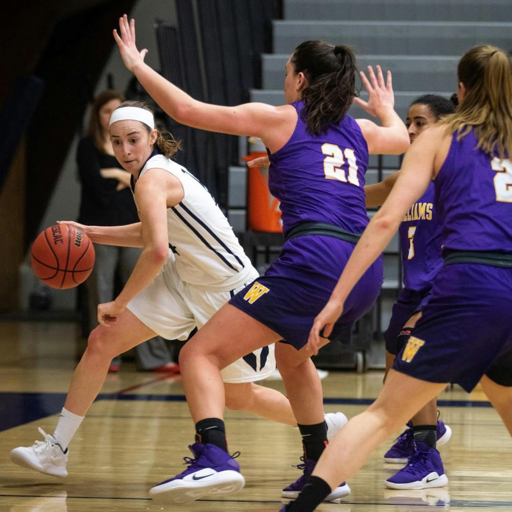<span class="photocreditinline">MICHAEL BORENSTEIN/THE MIDDLEBURY CAMPUS</span><br />Colleen Cavaney ’19 breaks through defenders, hitting 17 points against Williams on Saturday, Jan. 19.