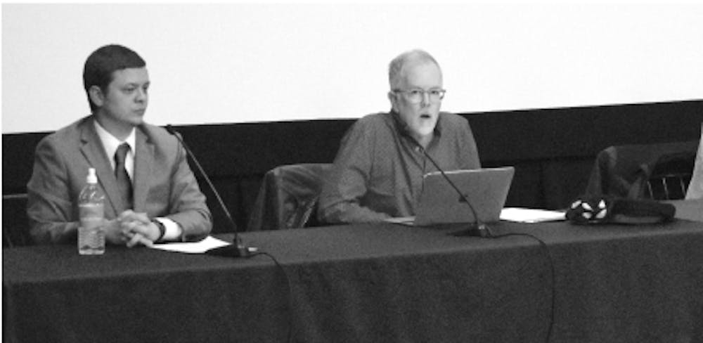 <span class="photocreditinline"><a href="https://middleburycampus.com/39367/uncategorized/benjy-renton/">BENJY RENTON</a></span><br />Kevin Moss, right, speaks at last Tuesday’s panel discussion.