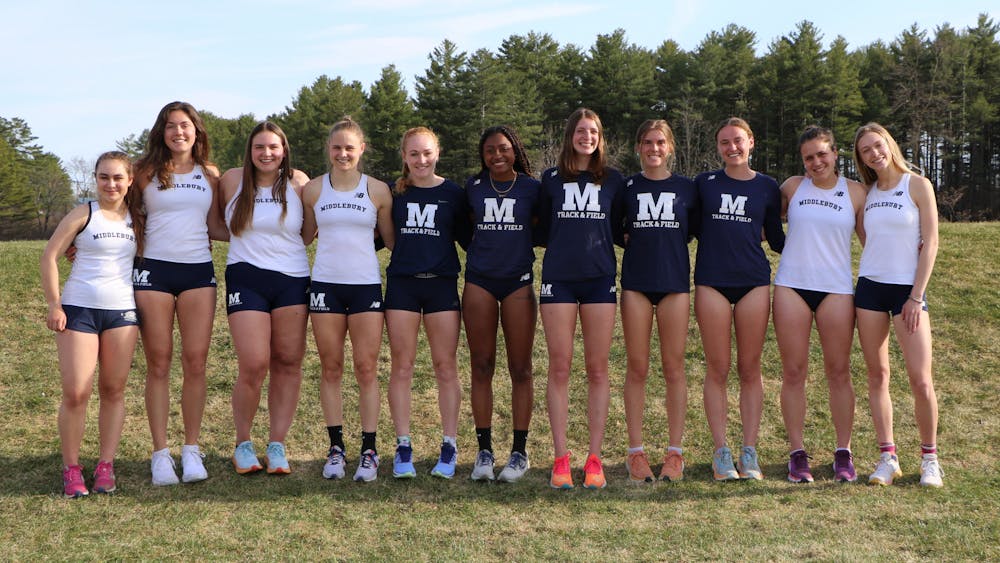 Seniors on the women’s track team pose before the Middlebury Outdoor Invitational this past Saturday.