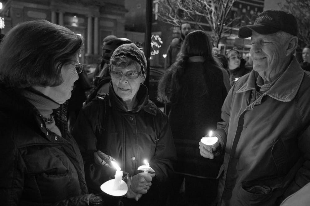 <span class="photocreditinline">YEAGER ANDERSON /JOHN GRAHAM SHELTER FACEBOOK </span><br />Residents stand in solidarity with those experiencing homelessness at the candlelight vigil in 2015.