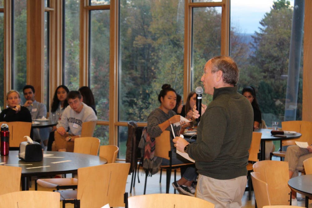 <span class="photocreditinline"><a href="https://middleburycampus.com/45758/uncategorized/emmanuel-tamrat/">EMMANUEL TAMRAT</a></span><br />Paper slips with questions such as “What do you like about economics?” were placed on tables at the dinner to encourage discussion about people’s perceptions of economics.
