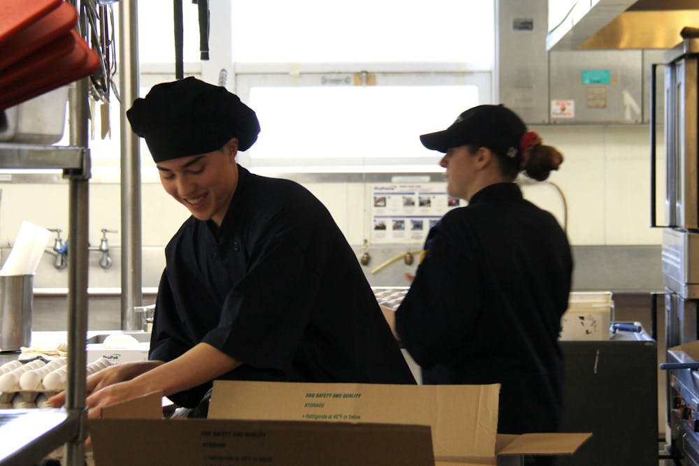 Dining services staff staff working in Proctor Dining Hall.