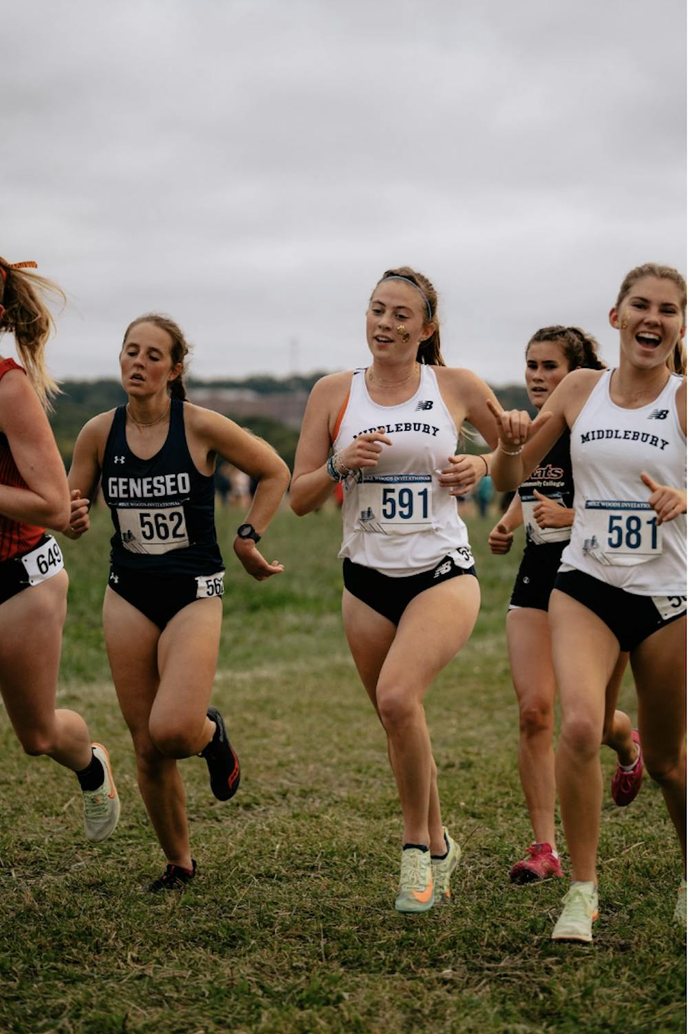Tatum Peskin ’24 (left) running with teammate Lucca Franz ’26 (right) at the Mike Woods Invitational on Oct. 1 in Geneseo, N.Y. 