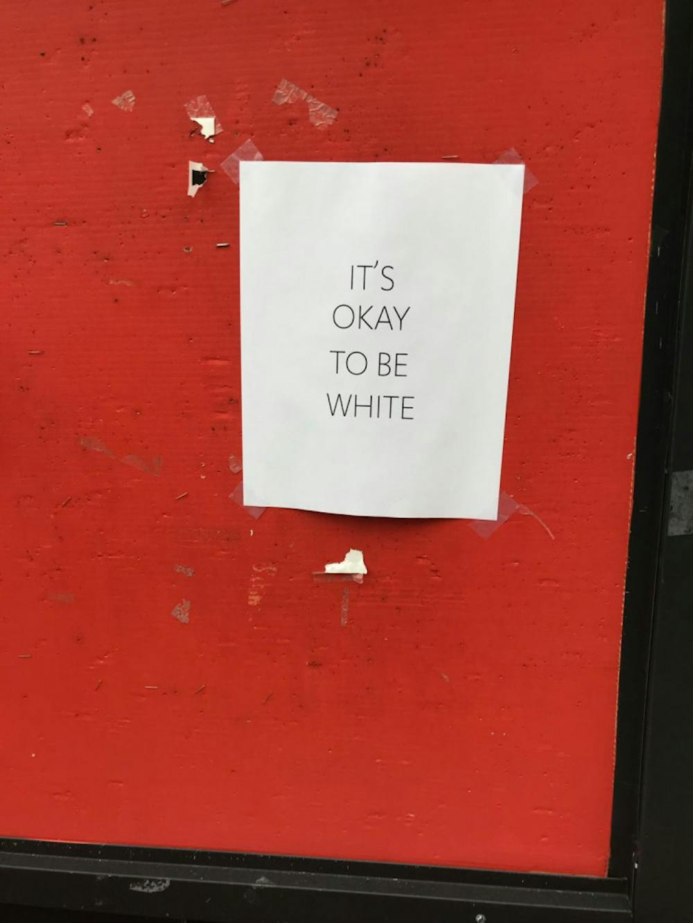 An anonymous flyer reading "IT'S OKAY TO BE WHITE" was found on a bulletin board in the Connell Student Center (CSC) on Mercer’s Macon campus November 8. 