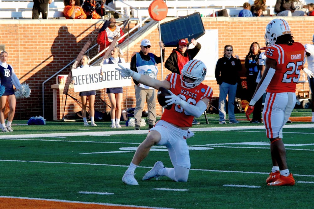 Sam Albee '27 celebrates his 17-yard reception late in the fourth quarter that put the Bears in the red zone.