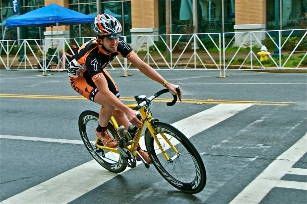 (photo courtesy of Mercer Cycling) Gabe Denes' yellow machine cruised to victory in a rain-soaked race in Dalton last weekend.