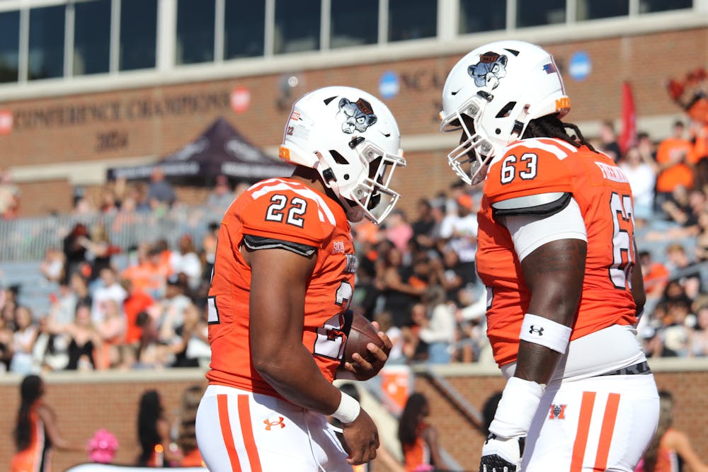 Running back CJ Miller '27 celebrates with Jamari Freeman '27 after a touchdown run against Virginia Military Institute on Oct. 25. 