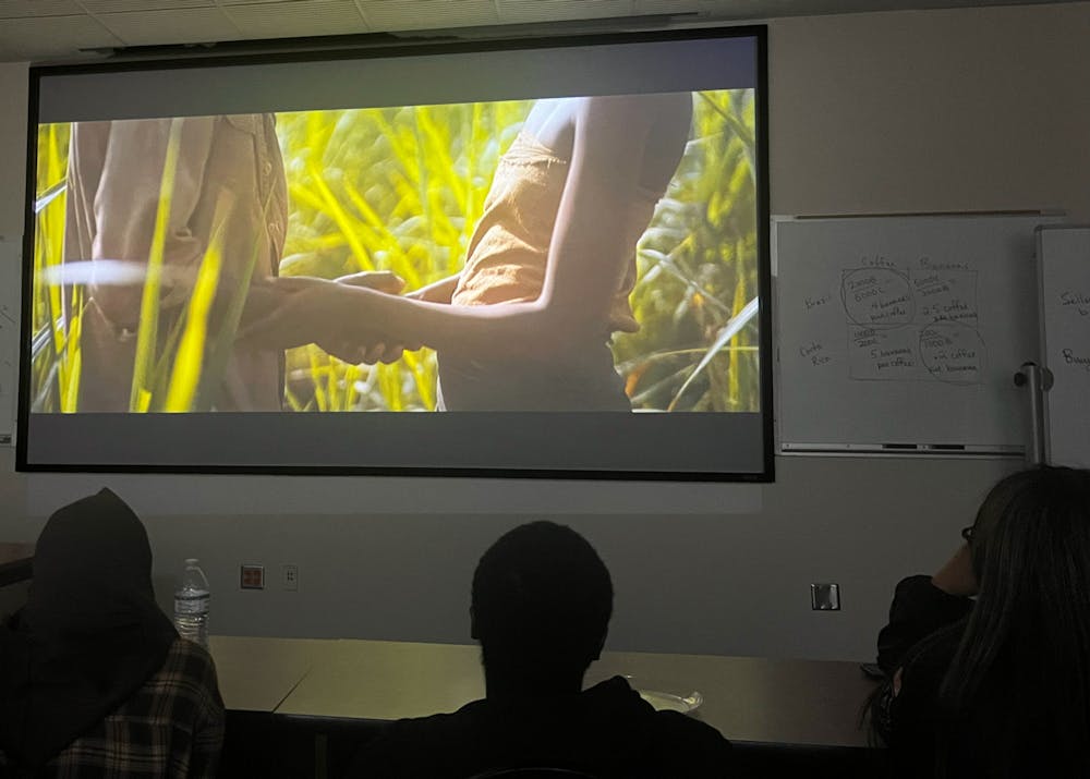 Students gather into Stetson classroom to watch "The Fist Grader," directed by Justin Chadwick, a film about pursuing primary education at 84-years-old after fighting on behalf of Kenya.