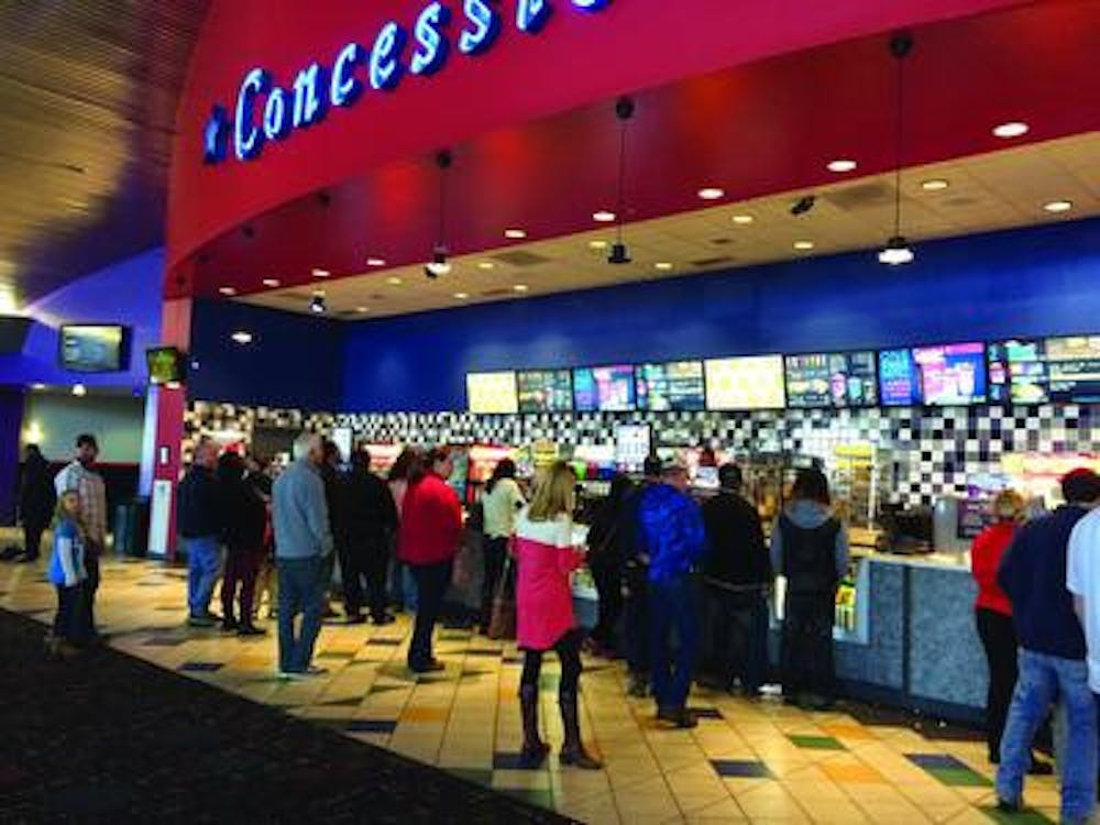 Macon residents wait for concessions at Amstar Cinema.