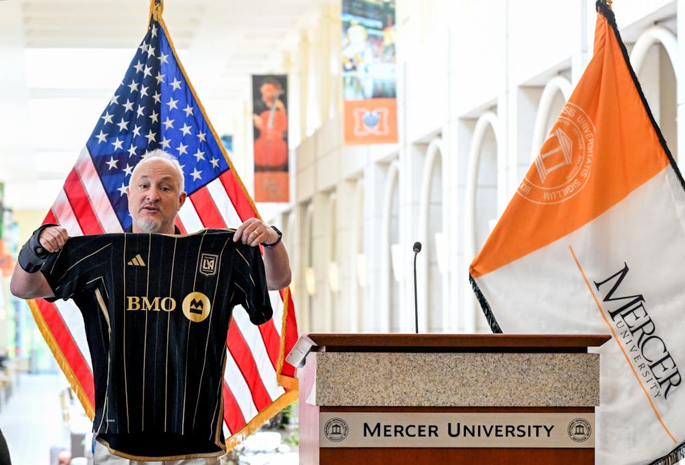 <p>Macon-Bibb County Mayor Lester Miller holds an LA FC jersey at Tuesday&#x27;s press conference, where he announced Macon will host the club as it prepares for this summer&#x27;s Club World Cup.</p>