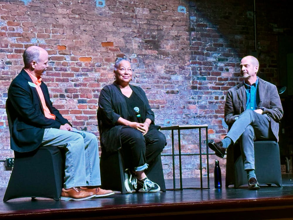 <p>From left to right, Douglas Thompson, Selina Lewis Davidson and Macky Alston answer audience questions about the film &quot;Acts of Reparation&quot; at the Douglass Theatre on Sept. 19.</p>