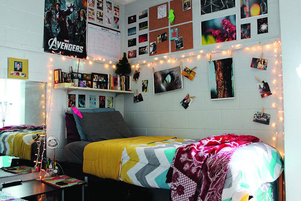 Adding comfortable pillows and blankets, customized wall decorations, and soft, unique lighting can transform a dorm room into the perfect cozy nook.