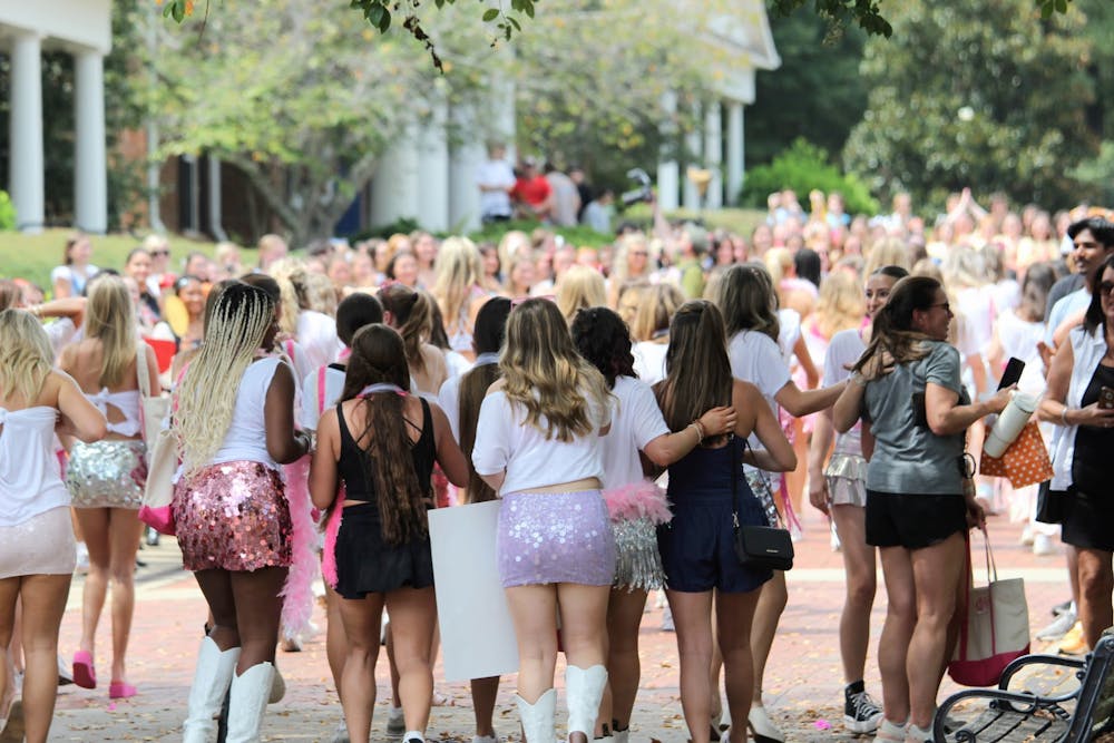 <p>New Panhellenic recruits walk onto Greek Row for Bid Day 2025, on Sept. 6.</p>