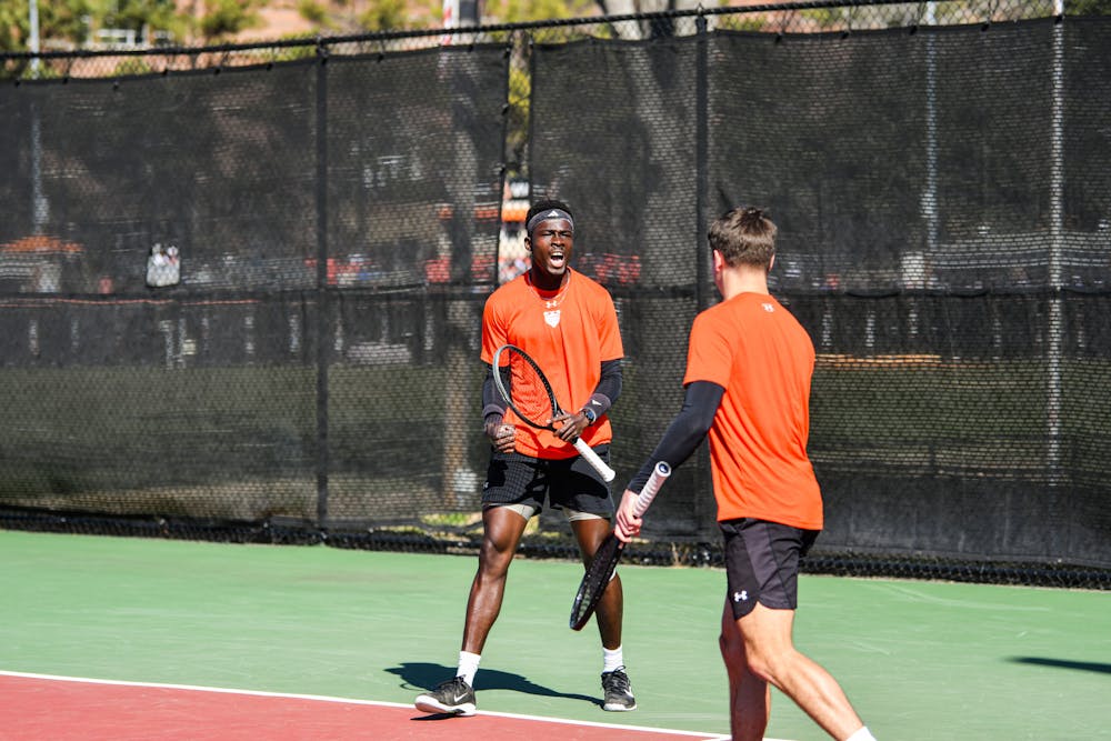 No. 1 doubles squad Hod'Ablo Isak Padio '26 and Nemanja Stefanovic '26 celebrate their match victory over Jacksonville State University on Feb. 8.