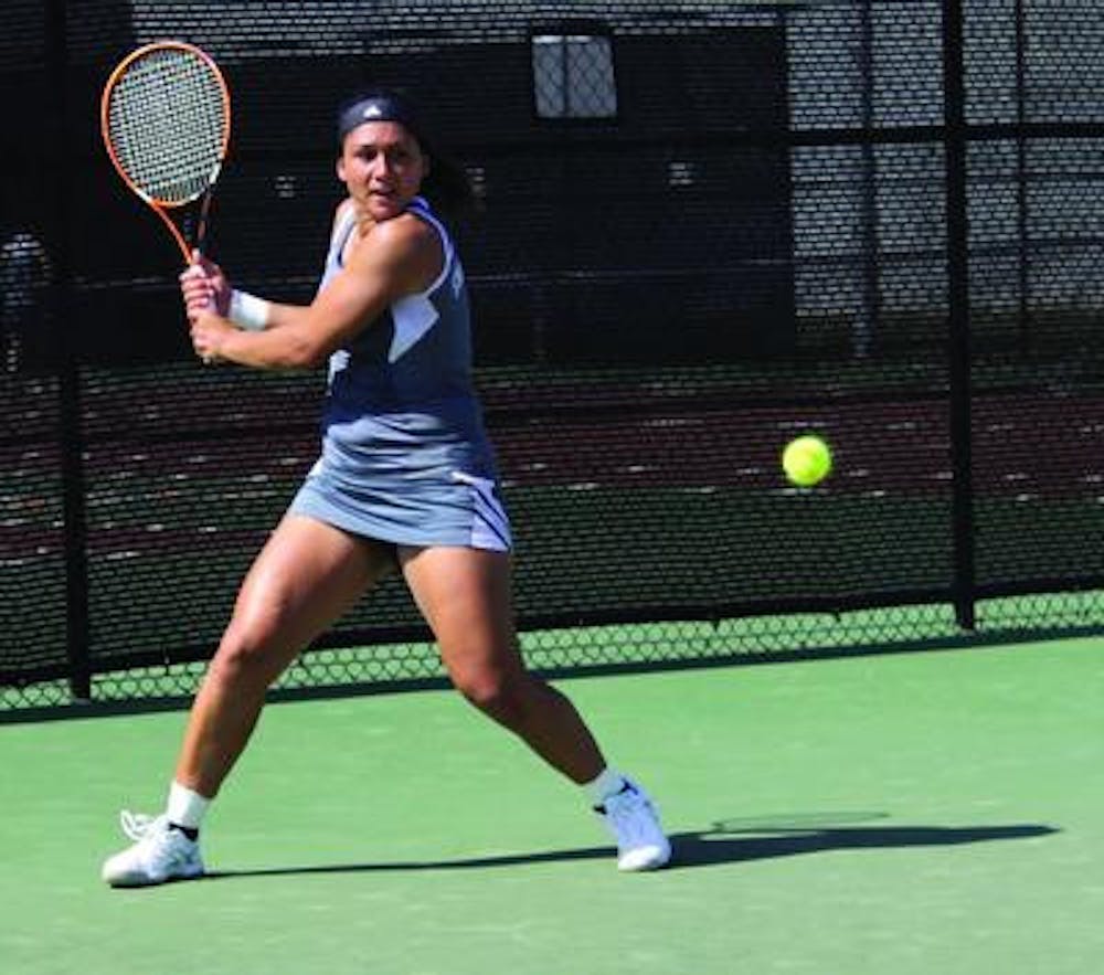 Mercer Women's Tennis Player, Junior Katia Stavroulaki, gets ready to swing against Furman March 20.