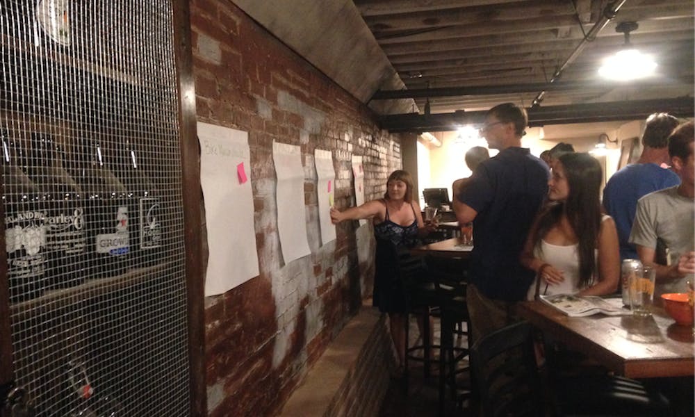 Everyone at the Bike Macon meeting was encouraged to brainstorm ideas for how to make the city more bike and pedestrian friendly. Photo cred Sarah Pounds.