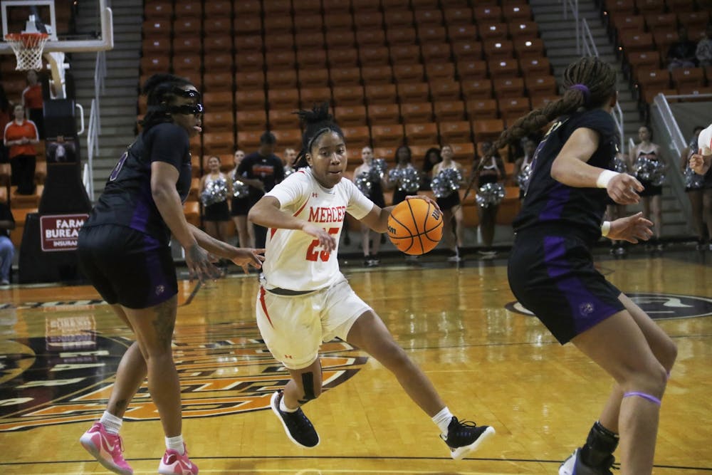 <p>Talia Harris &#x27;28 drives into the paint against Western Carolina University late in the 2024-25 regular season. The true freshman started every game for the Bears ﻿since Nov. 30, 2024.</p>