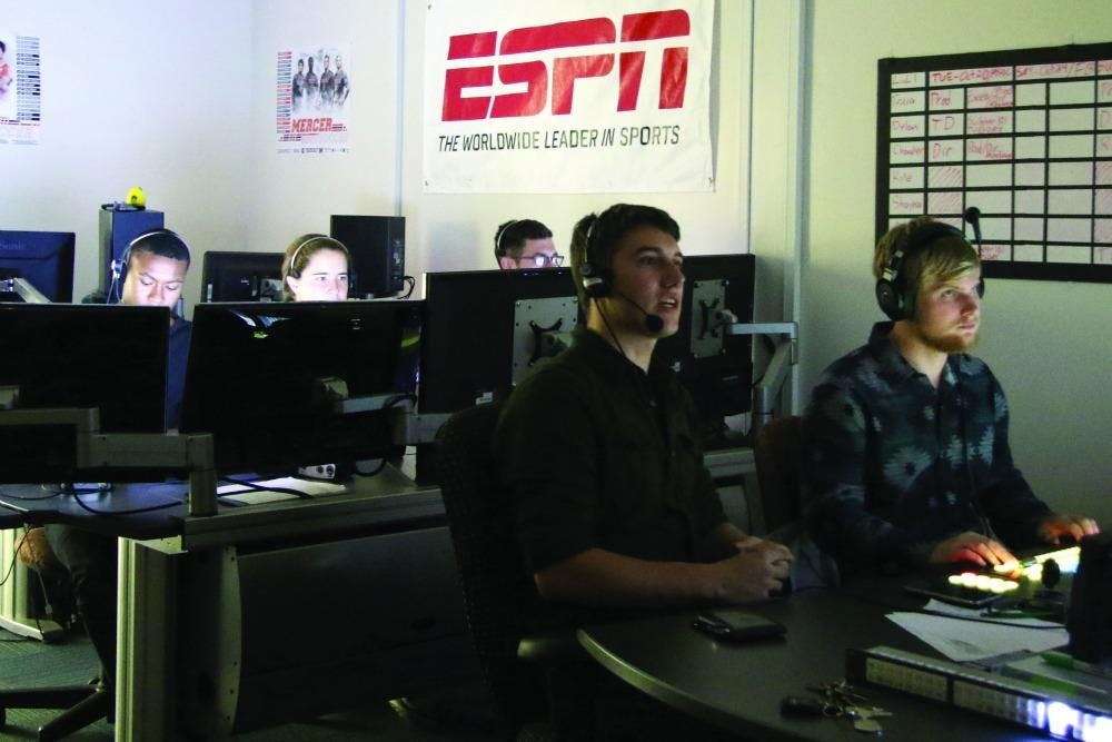 The ESPN crew work the show for the soccer game.