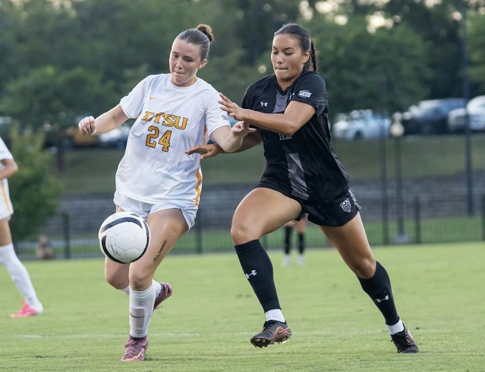 Forward Emily Rutkowski '30 fights for possession of the ball in Mercer's conference opener against East Tennessee State University.
