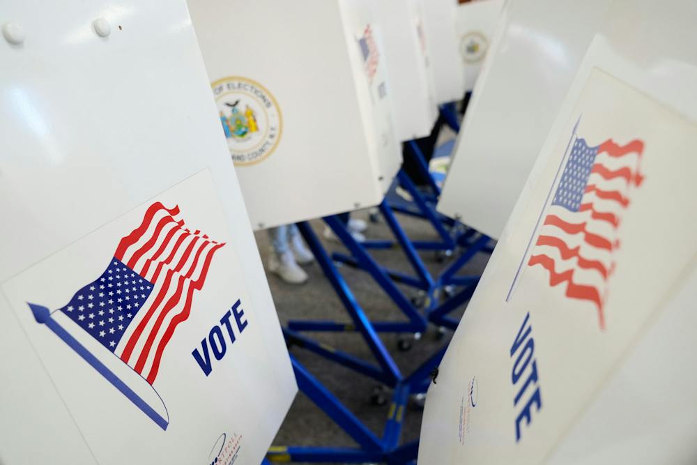 Voters use privacy booths to fill out their ballots at an early voting site in Haverstraw, N.Y., Monday, Oct. 26, 2026. (AP Photo/Seth Wenig)