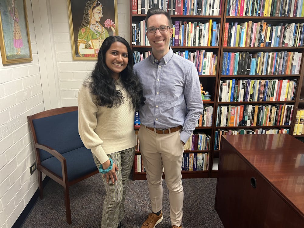 <p>Arsha Moorthy and Jason Smith, PhD and assistant professor of religion, pose together for a photo. Smith was instrumental to Moorthy and Patel’s research efforts into spiritual care in Middle Georgia. Picture provided Arsha Moorthy.</p>