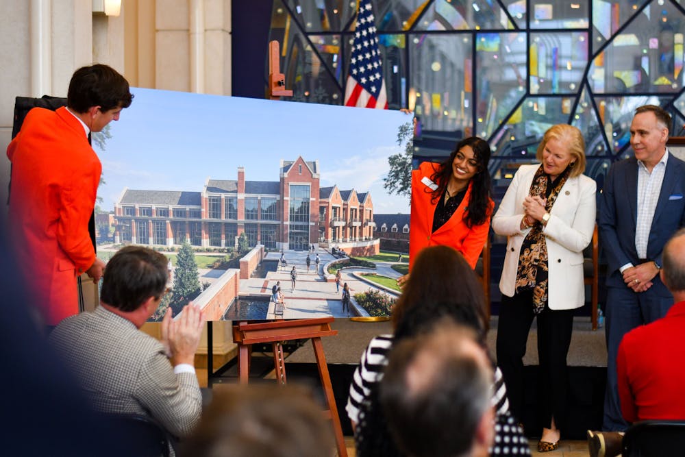 President Penny Elkins as well as Mercer Student ambassadors reveal renderings for the new yet-to-be-named student center on Sept. 1 in the University Center. 