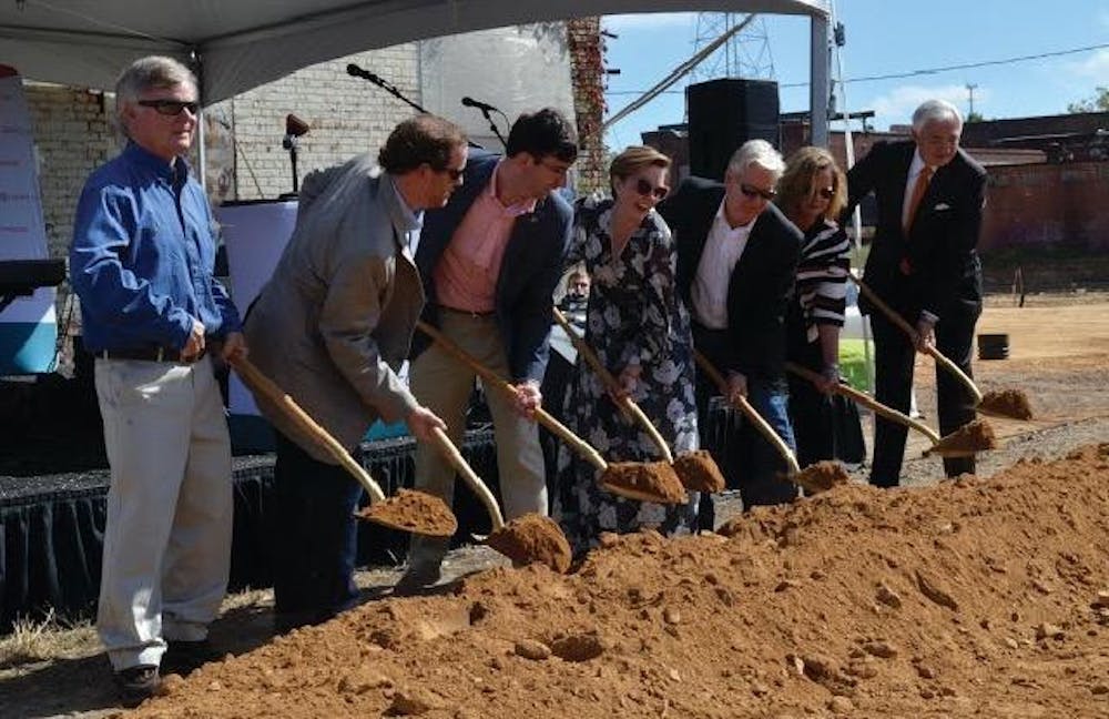 Macon leaders break ground on the Lofts at Capricorn and Mercer Music at Capricorn. Left to right: Benjy Griffith, Travis Griffith, josh Rogers, Jessica Walden, Jim Daws, Karen Lambert, and William Underwood
