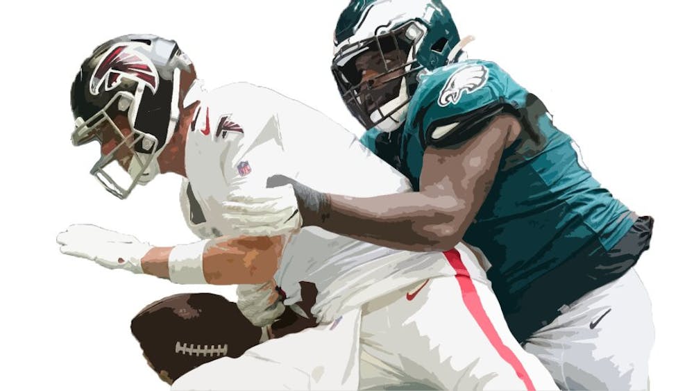 <p>Falcons quarterback Matt Ryan is sacked by Eagles defensive end Javon Hargrave in their game on Sept. 12. The Falcons would lose this game 6-32. </p>