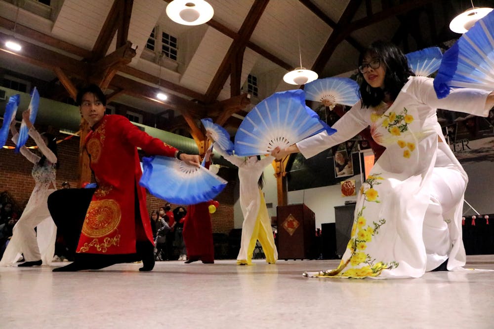 <p>Mercer’s Vietnamese Student Association performs a fan dance at the Mercer Asia Lunar New Year Dinner.</p>