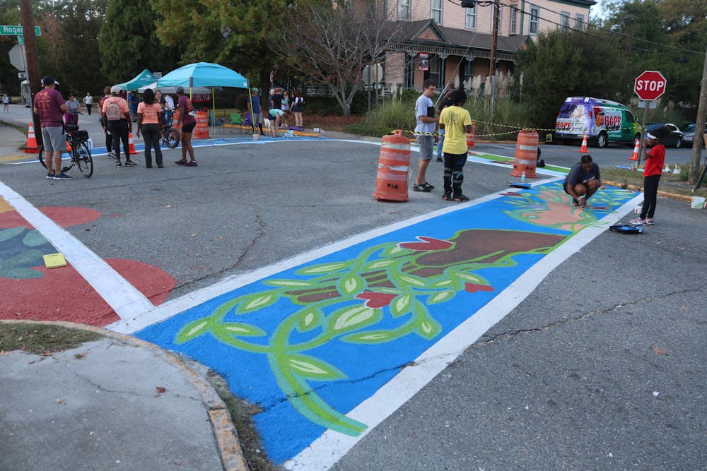 The crosswalk is painted on Clayton St. connecting the Vineville neighborhood to the Pleasant Hill neighborhood in Macon during Open Streets Macon's community event on Nov. 6.