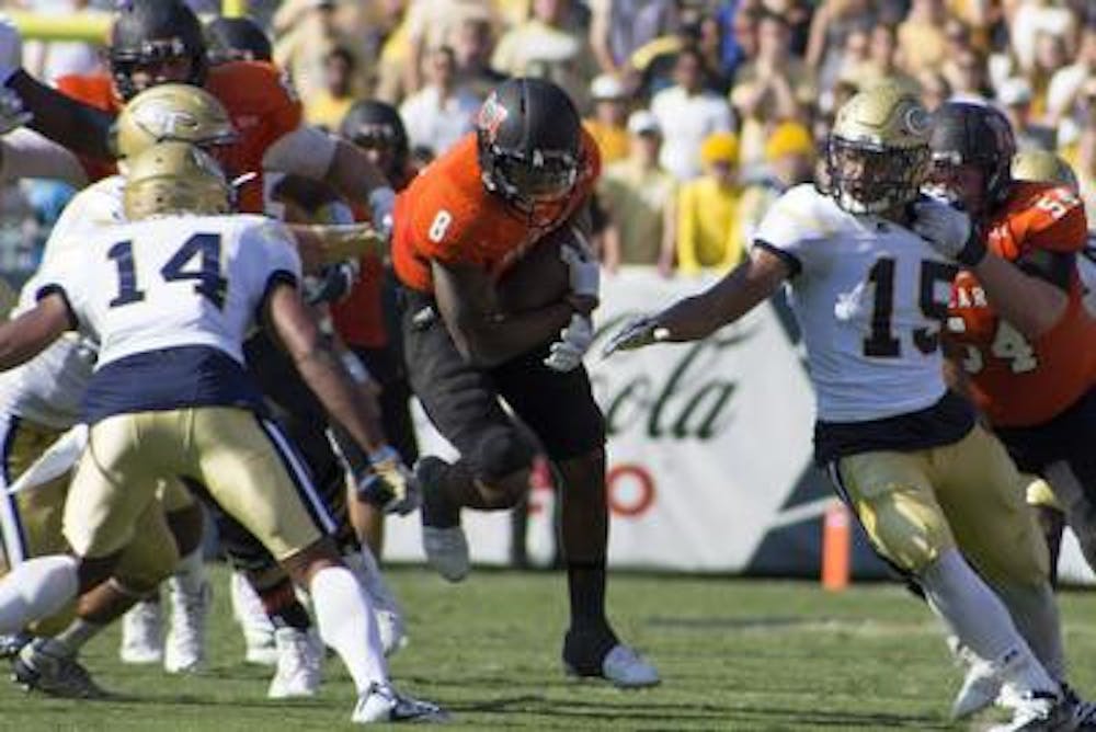 Jenna Eason.
Mercer's Marquise Irvin (8), middle, runs the ball in their game against Georgia Tech.
