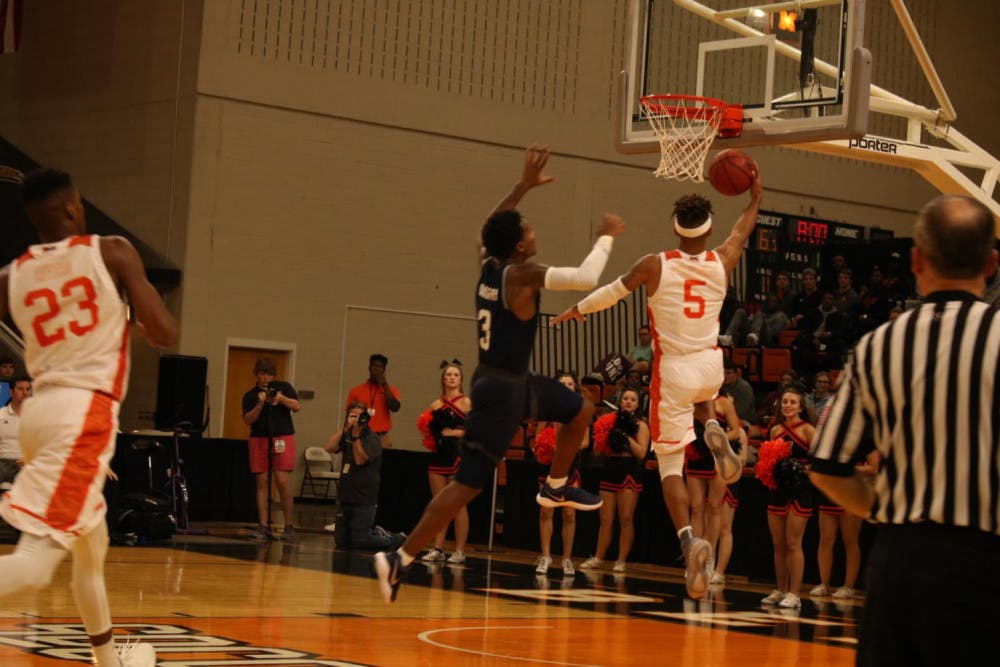 Senior guard JOrdan Strawberry (No. 5) takes it to the rim in the Bears' 86-56 win over Jackson State Tuesday.