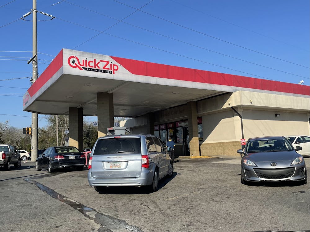 <p>The Quick Zip gas station on Pio Nono Avenue where two Mercer students and a friend were carjacked Monday, Feb. 7.</p>