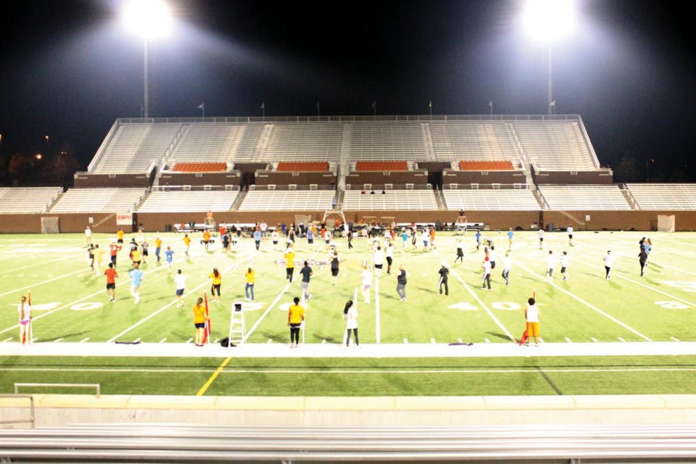 The view from the Mercer stadium as Mercer's marching band practices their routine.
