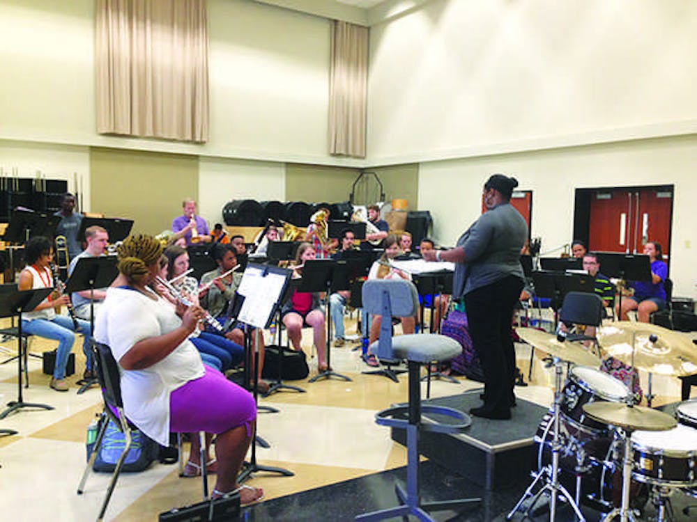 Members of the Wind Ensemble are hard at work in preparation for their upcoming concert. 