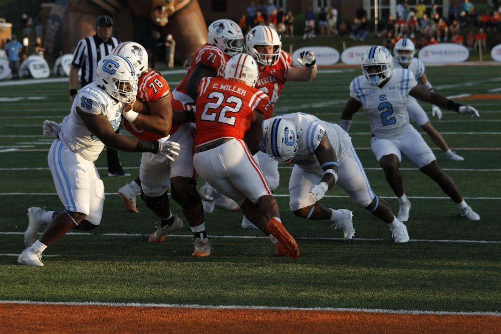 <p>CJ Miller &#x27;27 carries the ball against The Citadel on Sept. 21. Miller started on Saturday, Nov. 9, and scored his third career touchdown against the Virginia Military Institute.</p>