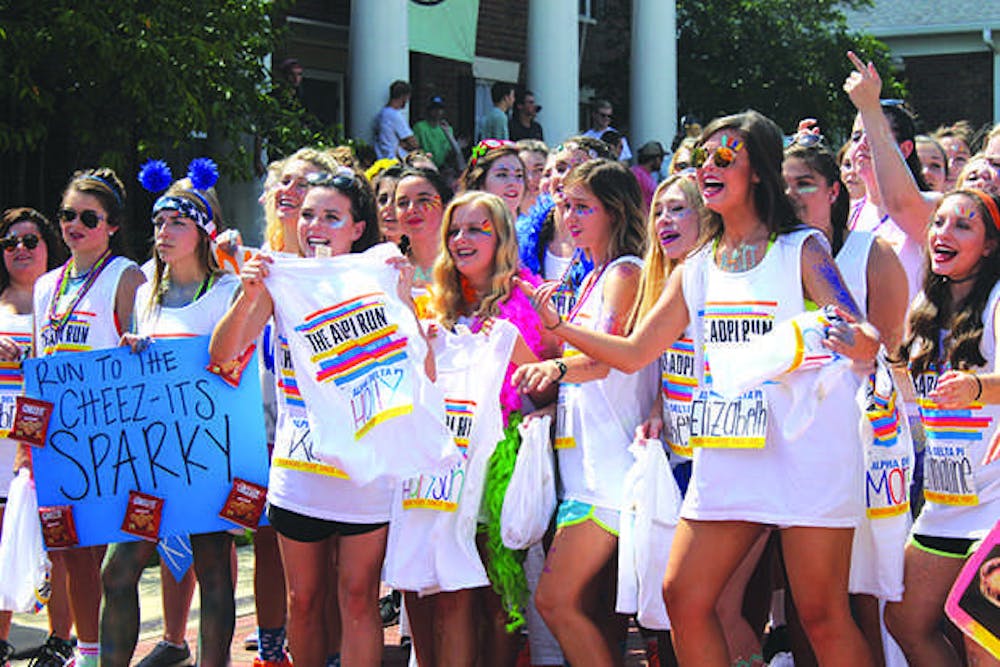 Initiated sisters of Alpha Delta Pi await the arrival of their new recruits.