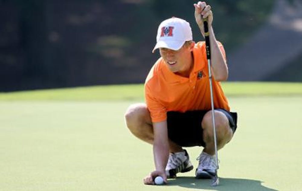 (photo courtesy of MercerBears.com) Thomas Holmes lines up a putt as he would record a +2 on the final day of the tournament to move up five spots for a tie of 52nd place. Holmes and Bears travel next to Chateau Elan for the 2011 Atlantic Sun Championship.