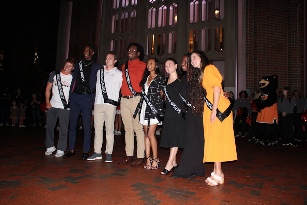 Mercer's 2022 Homecoming Court poses for a photo on Cruz Plaza following a pep rally. From left to right, Bennett Cate, Matt Encarnacion, Jack Grimsley, Justin Henry, Abigail Yemisrach, Amelia Junod, Ashton Mayo-Beavers and Michelley Pereira. 