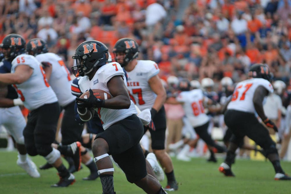 CJ Leggett runs the ball during a play by Mercer at the Mercer vs. Auburn game at Auburn University.