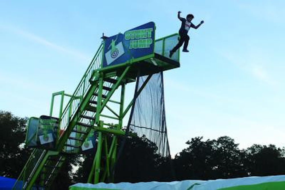 A festival-goer participates in the "stunt jump," an interactive workshop that shows how movie stunts are done.